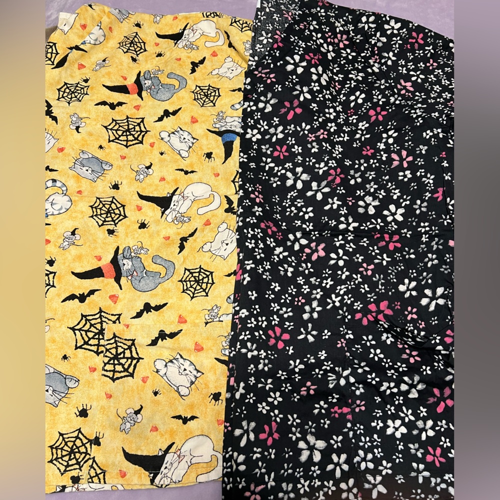 2 women’s scrub tops